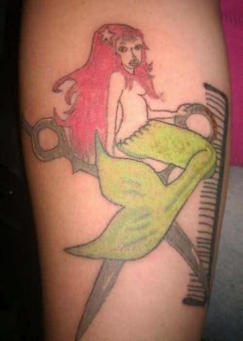 Simple Comb And Scissor With Mermaid Tattoo On Forearm
