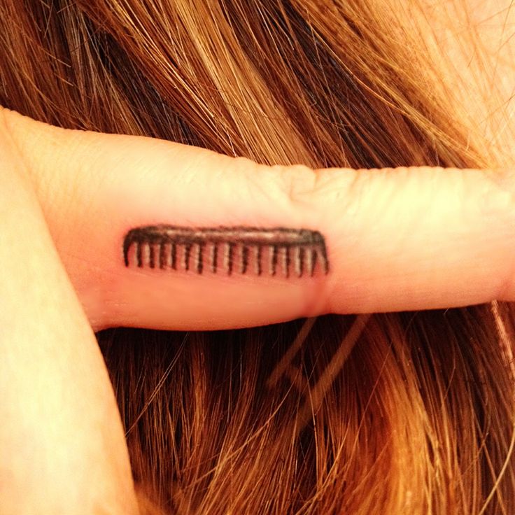 Small Comb Tattoo On Finger