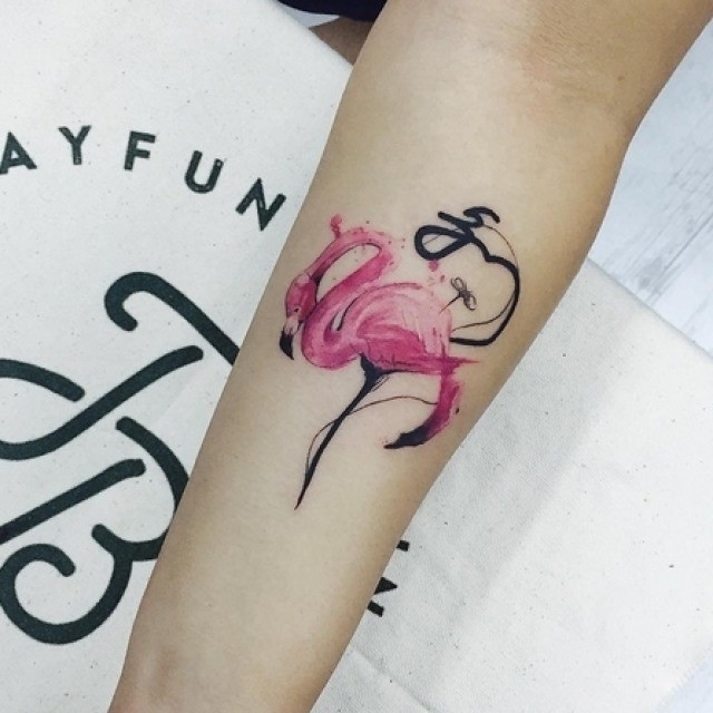 Small Watercolor Flamingo Tattoo On Forearm