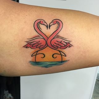 Super Cute Two Flamingos Making Heart Shape With Heads Tattoo On Forearm
