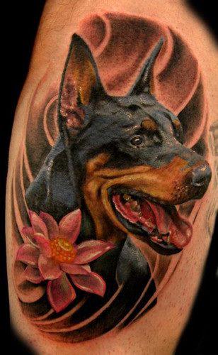 Terrific Doberman With Red Flower Tattoo