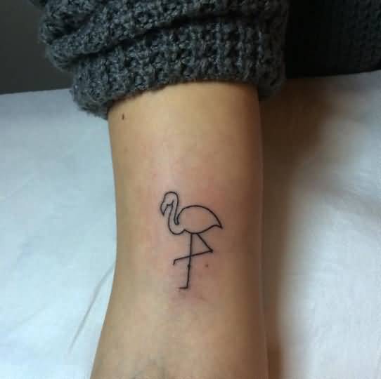Tiny Black Inked Flamingo Tattoo On Leg