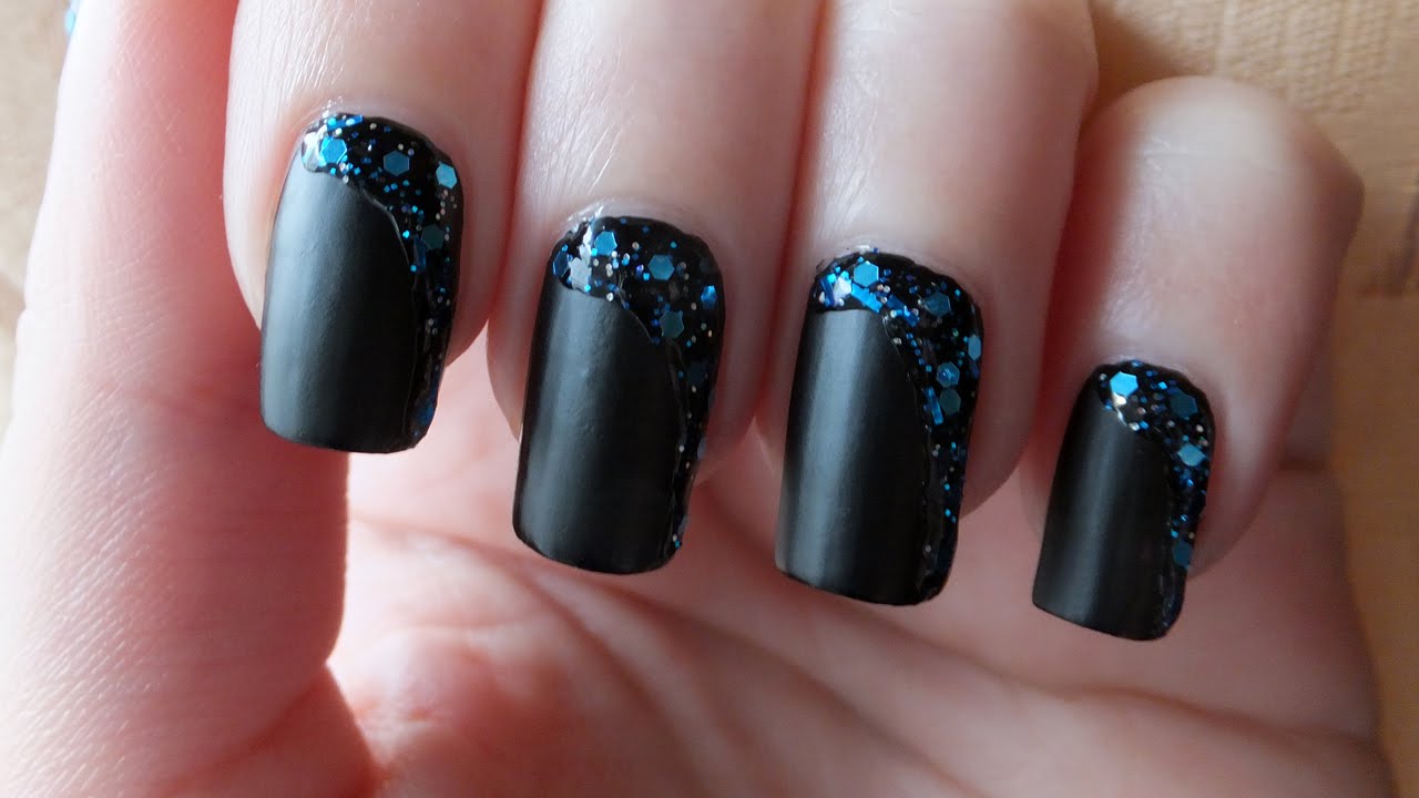 Black Matte Nail Art With Blue Glitter Design