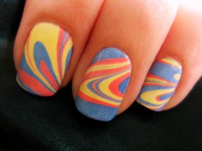 Blue Yellow And Orange Marble Nail Art