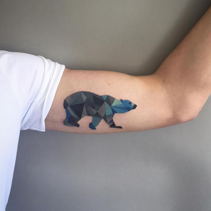 Colorful Geometric Tiny Polar Bear Tattoo On Bicep By Sasha