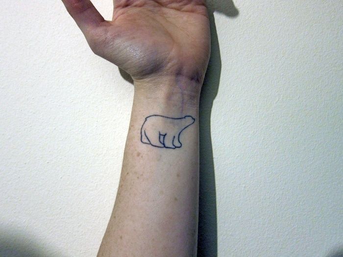 Cute Small Outline Polar Bear Tattoo On Wrist