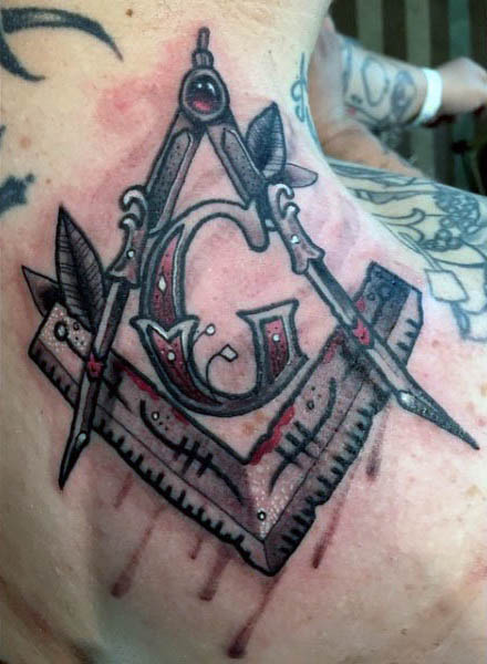 Masonic Symbol Tattoo On Upper Back