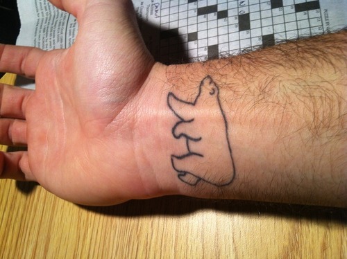 Outline Small Polar Bear Tattoo On Wrist