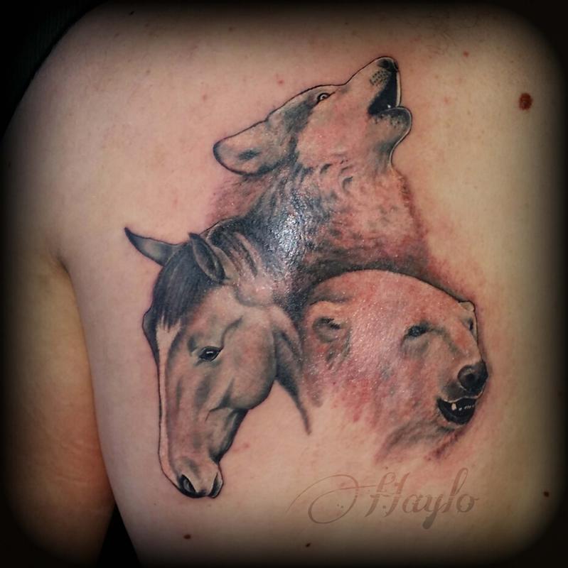Realistic Polar Bear With Wolf And Horse Heads Tattoo On Upper Back
