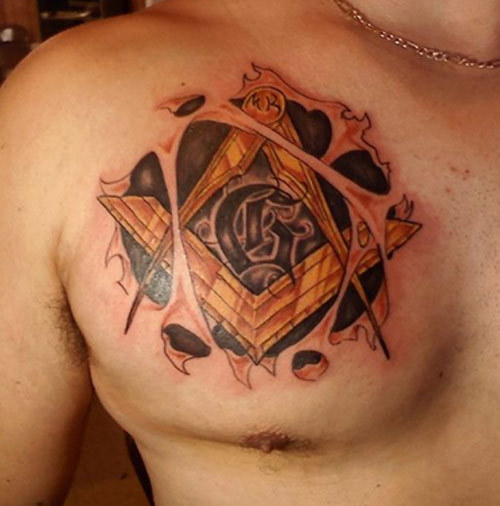 Ripped Skin Masonic Tattoo On Man Chest