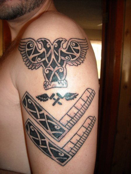 Tribal Eagle And Masonic Tattoo On Man Left Half Sleeve