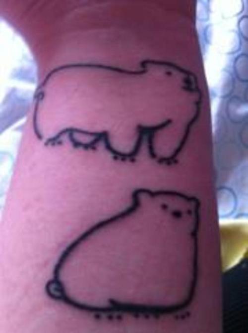 Two Small Outlined Polar Bears Tattoo On Wrist