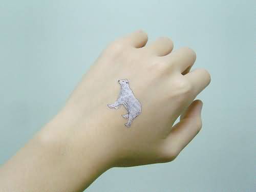 Very Small White Polar Bear Tattoo On Hand