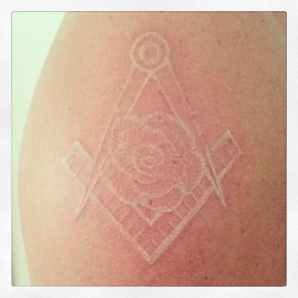White Ink Masonic Symbol Tattoo