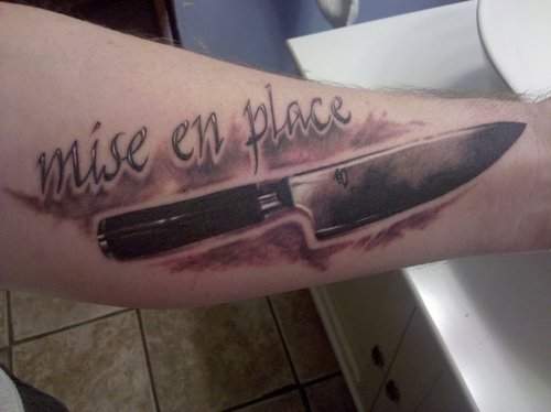 Amazing Chef Knife With Mise En Place Tattoo On Forearm