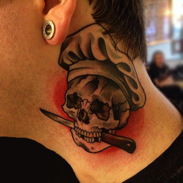 Amazing Chef Skull Holding Knife With Mouth Tattoo On Side Neck Tattoo