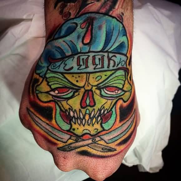 Awesome Chef Skull And Knives Hand Tattoo On Hand