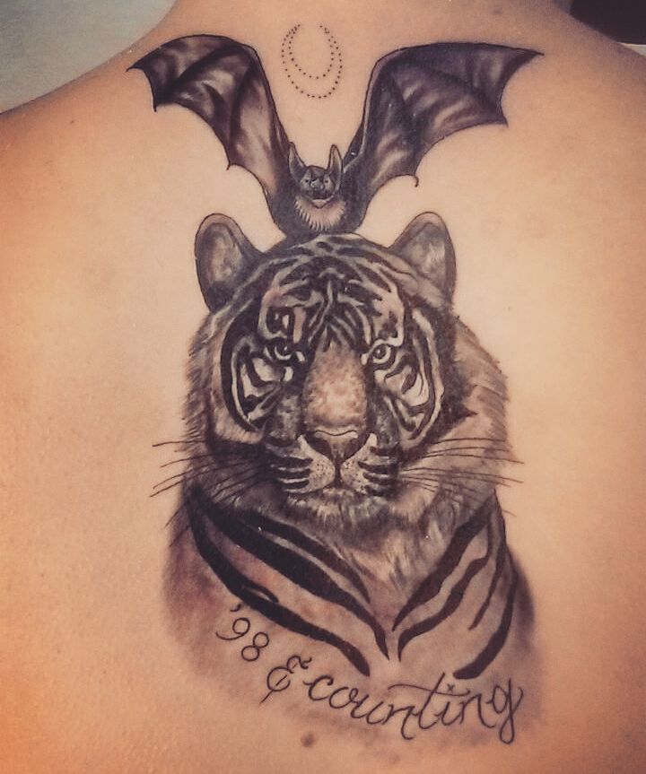 Bat On Tiger Head tattoo On Upper Back by Kyle Kemp