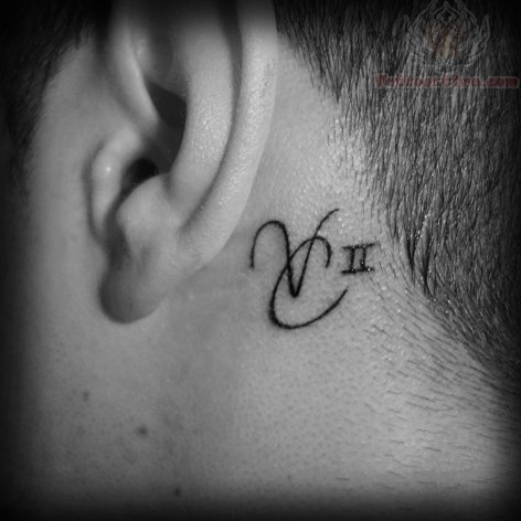 Beautiful Roman Numeral Five And Two Tattoo On Behind Ear