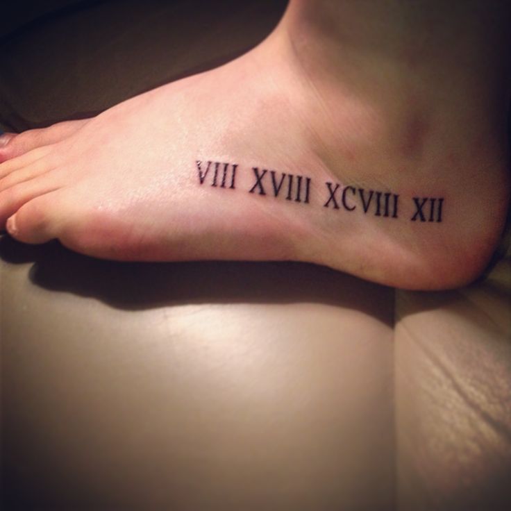 Beautiful Roman Numerals Tattoo On Foot