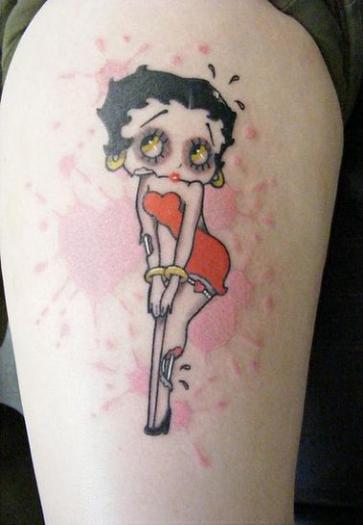 Betty Boop In Orange Dress Tattoo On Side Thigh
