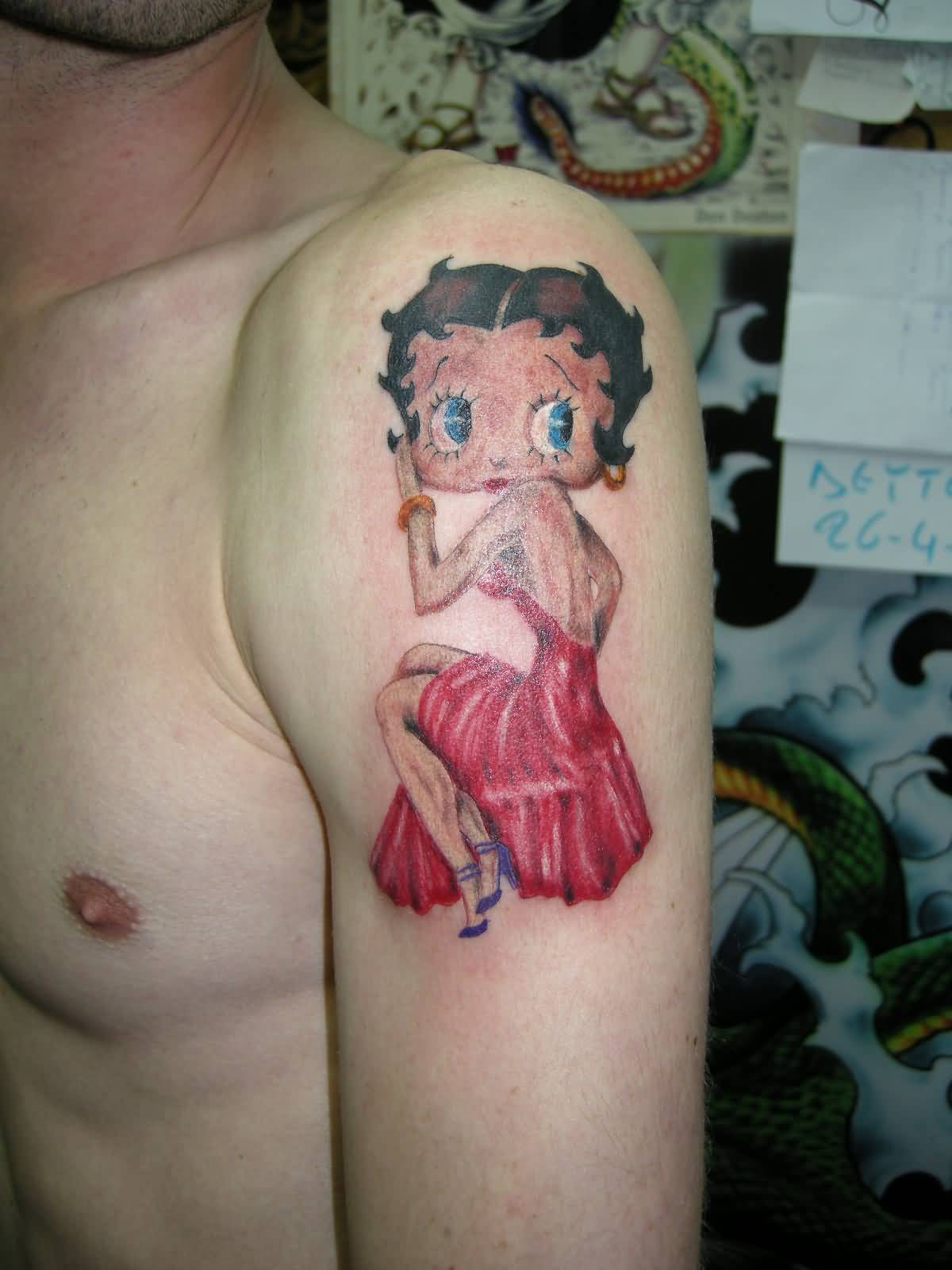 Betty Boop Painting Tattoo On Man Left Shoulder