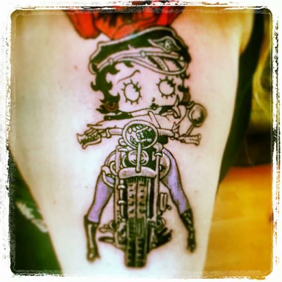 Biker Betty Boop Tattoo On Left Half Sleeve