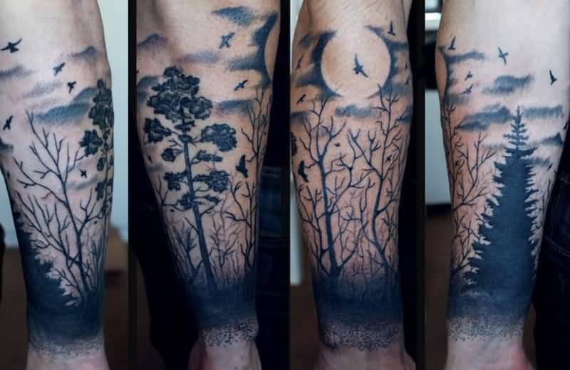 Black And Blue Ink Forest Tattoo On Sleeve