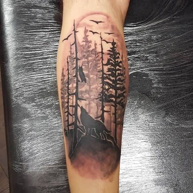 Black And Grey Wolf With Forest Tree Tattoos On Leg