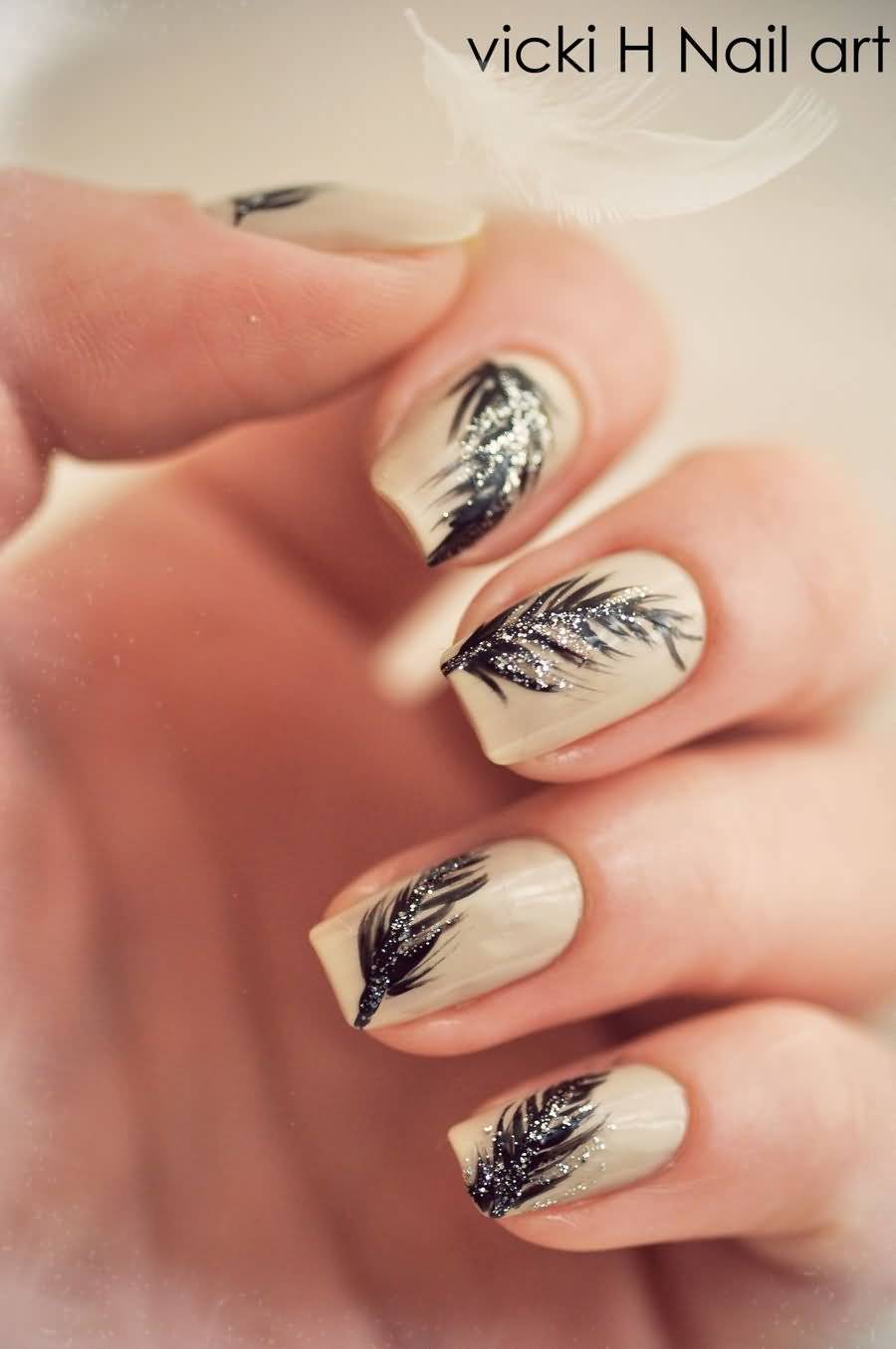 Black And Silver Glitter Feather Nail Art