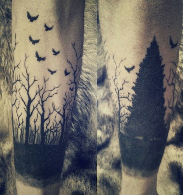 Black Flying Birds And Forest Trees Tattoo On Arm