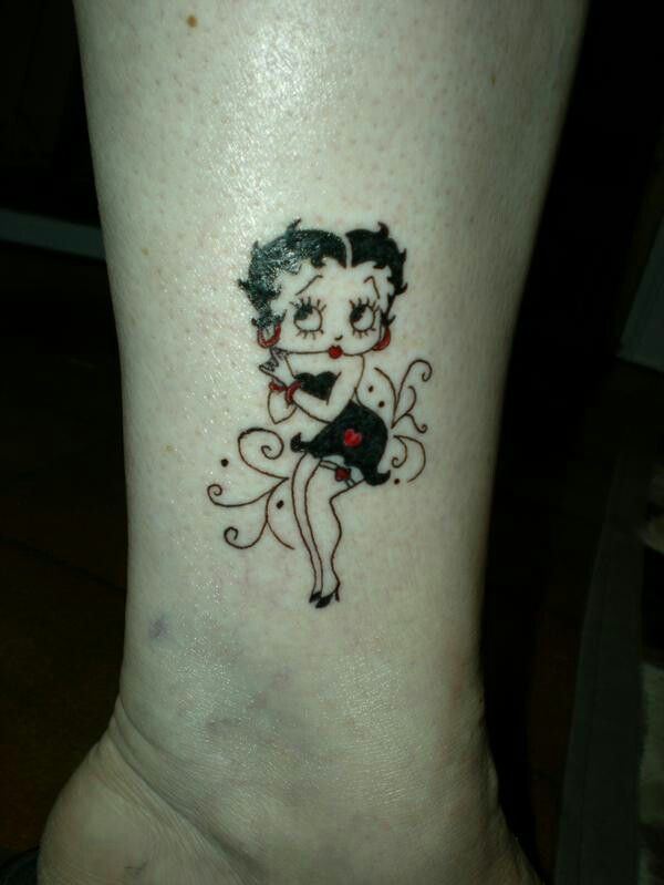 Black Ink Betty Boop Tattoo On Leg