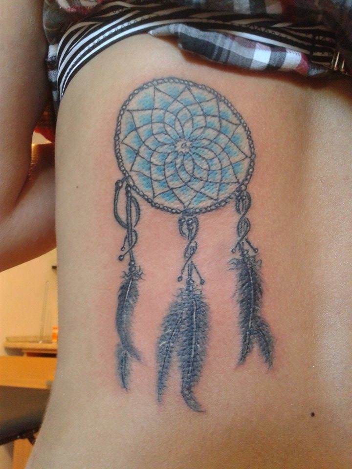 Blue Dreamcatcher Tattoo On Girl Side Rib by Marley