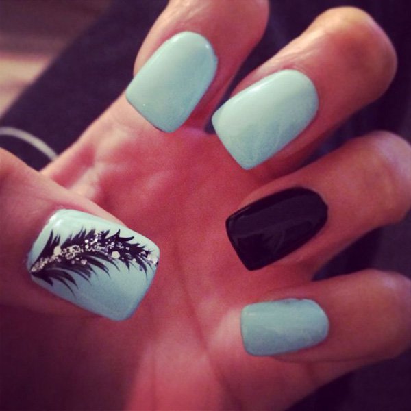 Blue Nails With Black And Silver Feather Nail Art