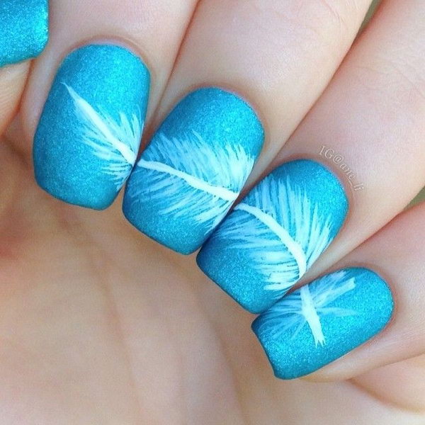 Blue Nails With White Feather Nail Design Ideas