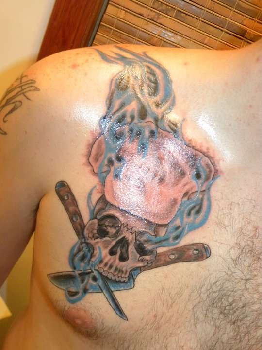 Burning Chef Skull With Knives Tattoo On Right Shoulder