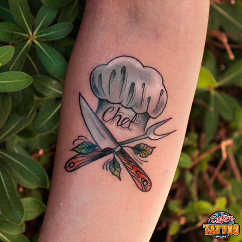 Chef Hat With Crossed Knives Tattoo On Forearm