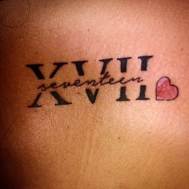Cool Roman Numeral With Seventeen And Heart Tattoo