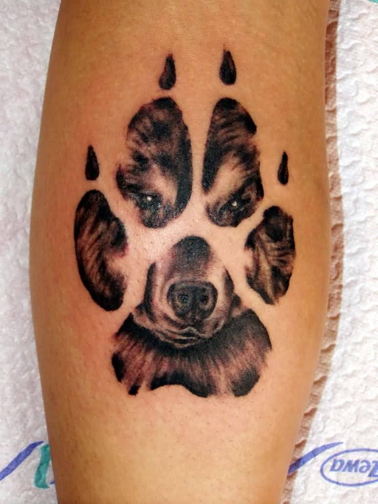 Coyote Face in Paw Print Tattoo On Leg