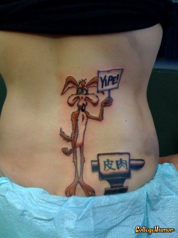 Coyote With Yipe Banner In Hand Tattoo On Girl Lower Back