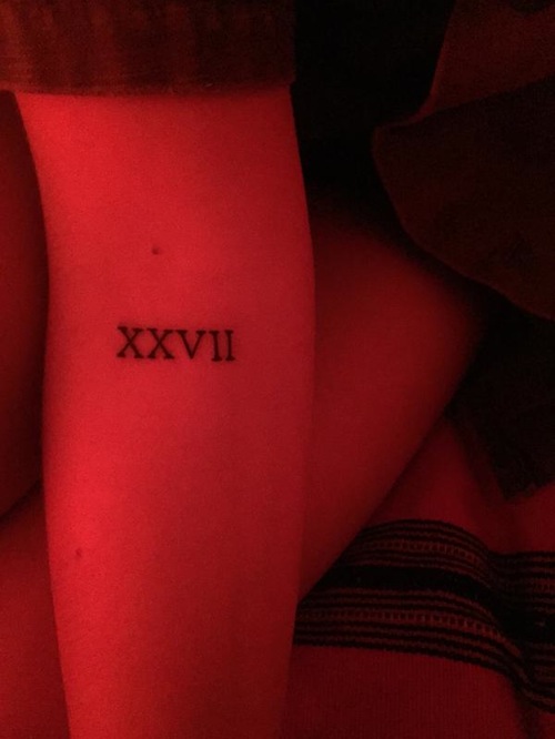 Cute And Small Roman Numeral Tattoo
