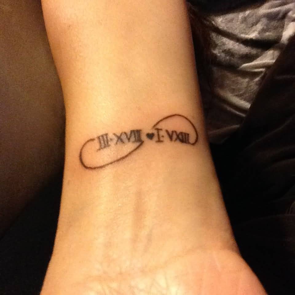 Cute Infinity With Roman Numerals Tattoo