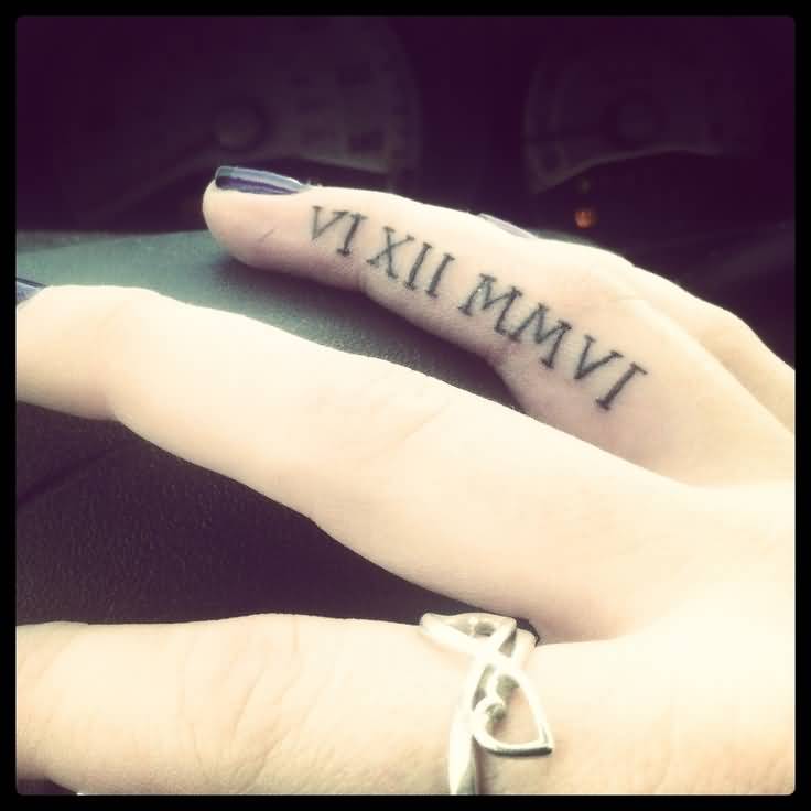 Finger Roman Numerals Tattoo