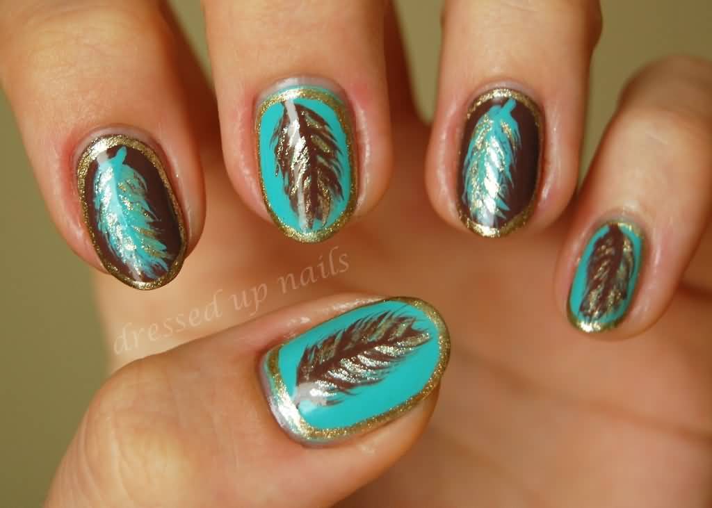 Gold Glitter Feather Nail Art On Green Nails