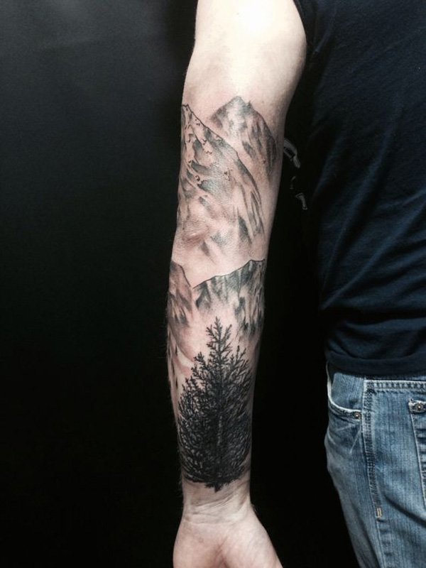 Grey Ink Mountains And Forest Tattoo On Left Sleeve
