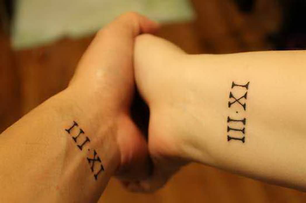 Illusion Roman Numeral Tattoos On Wrists