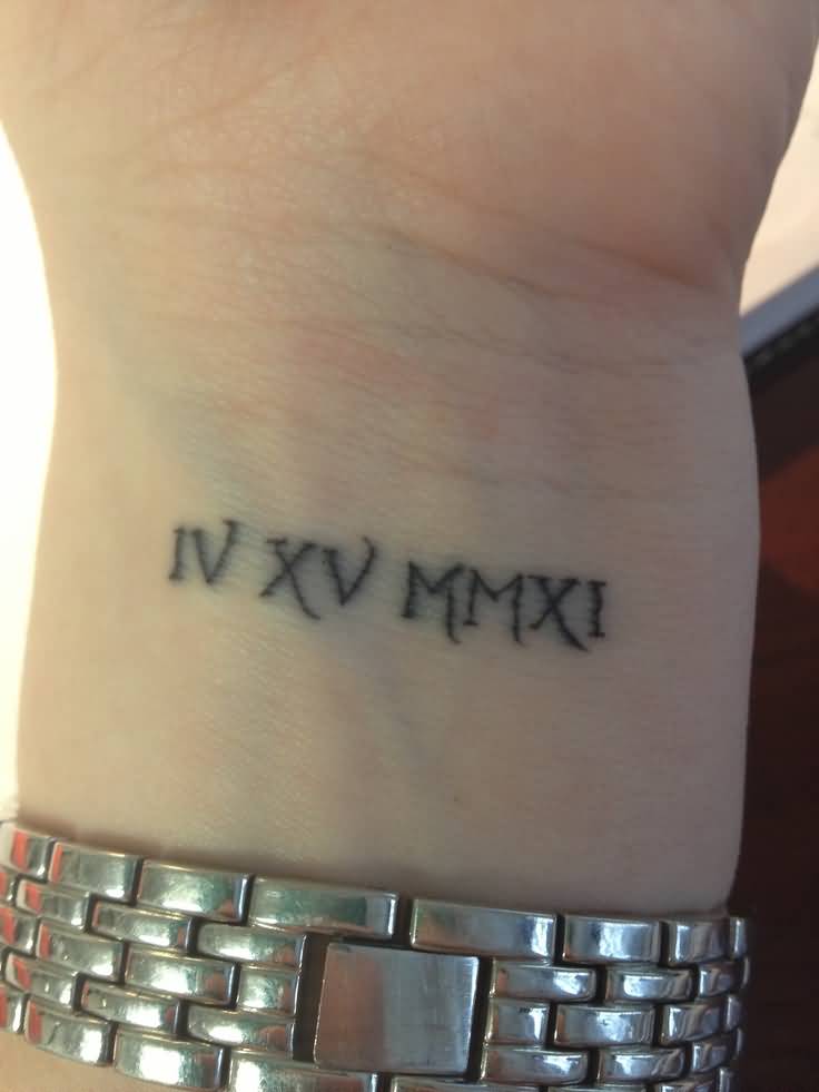 Incredible Tiny Roman Numerals Tattoo On Wrist