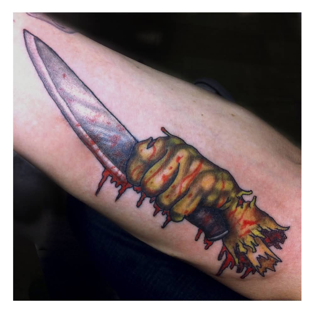 Killer Chef Hand Holding Knife Tattoo