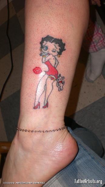 Lip Print And Betty Boop Tattoo On Side Leg