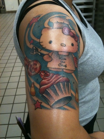 Little Chef Kitty With Cup Cake And Stars Tattoo On Half Sleeve